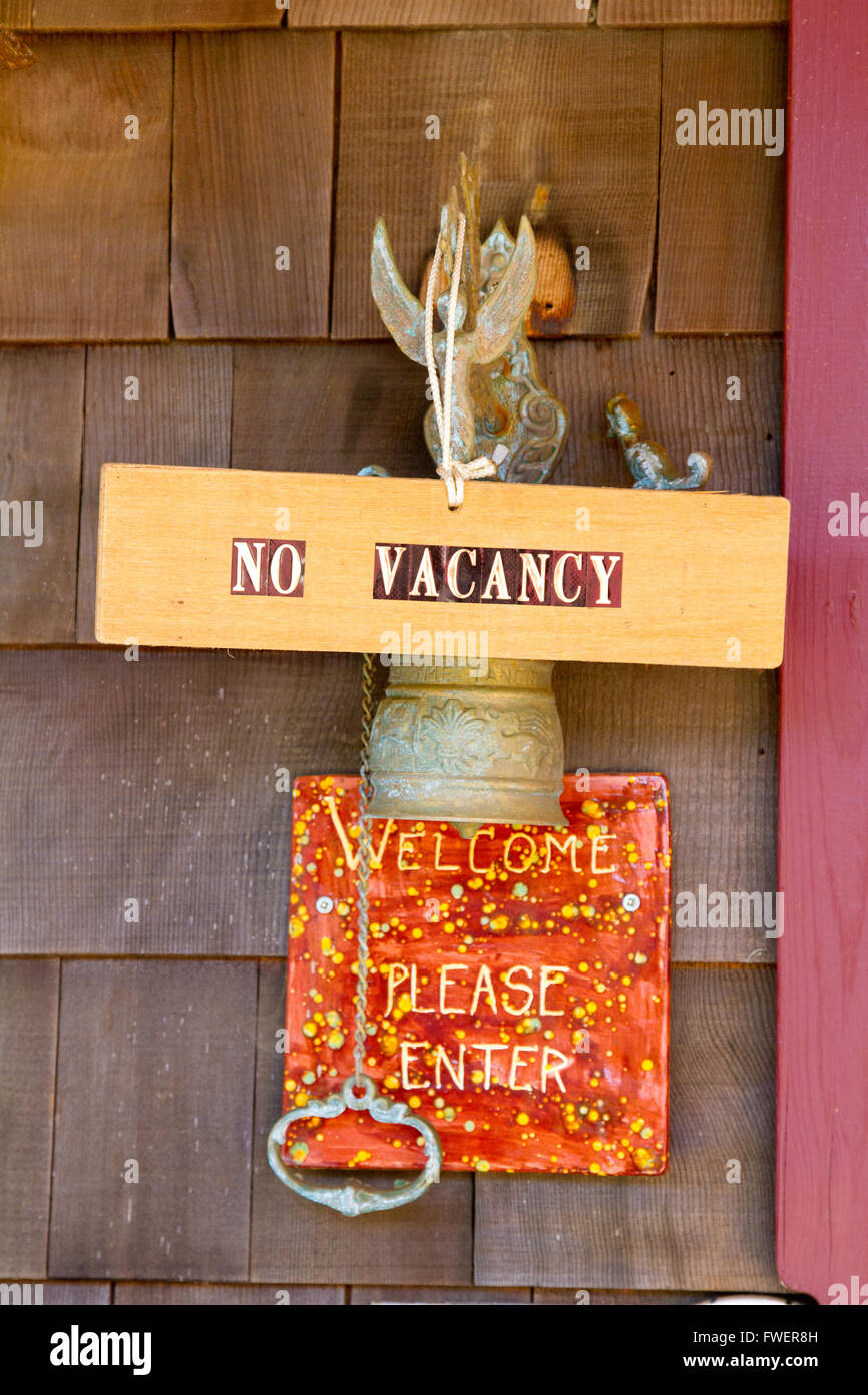 A sign says no vacancy outside of a bed and breakfast type hotel in Oregon. Stock Photo
