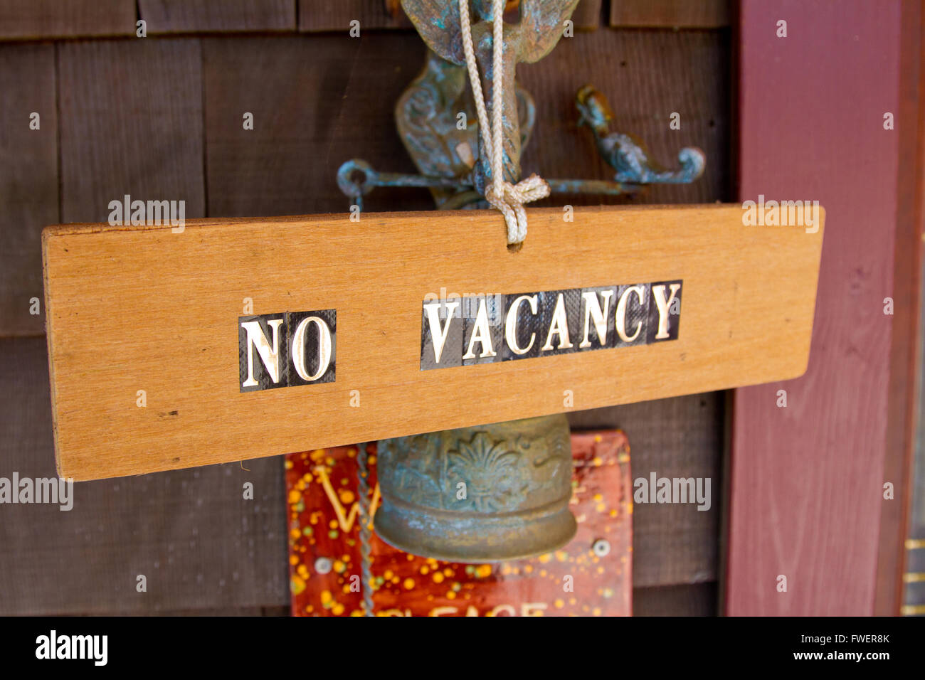 A sign says no vacancy outside of a bed and breakfast type hotel in Oregon. Stock Photo