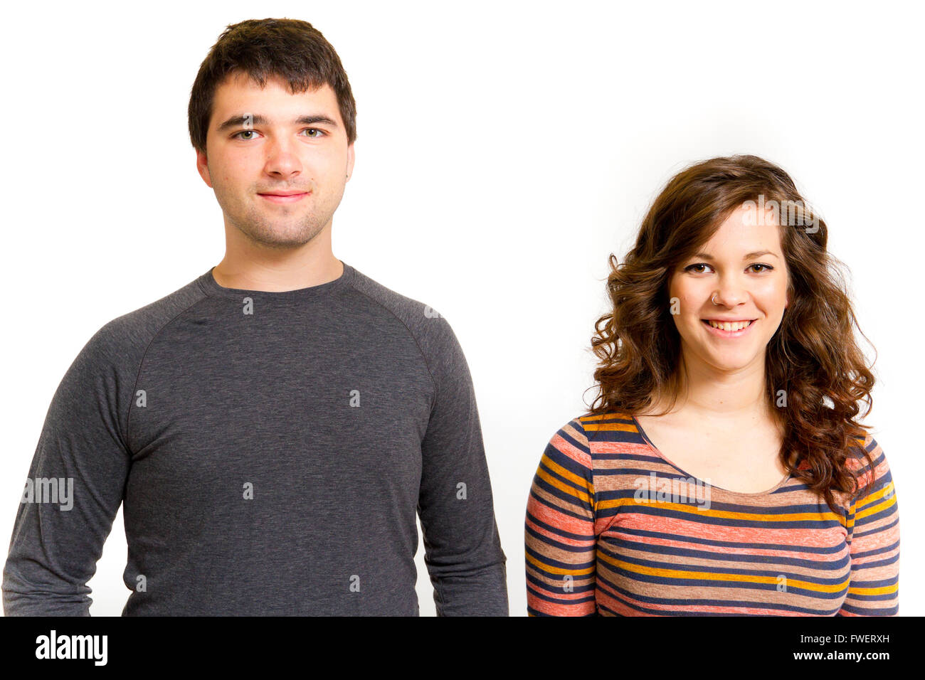A man and a woman in a studio against an isolated white background for ...