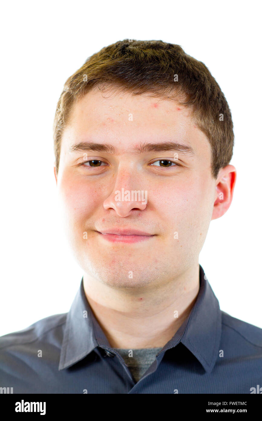 A young adult college student is photographed in the studio agains an