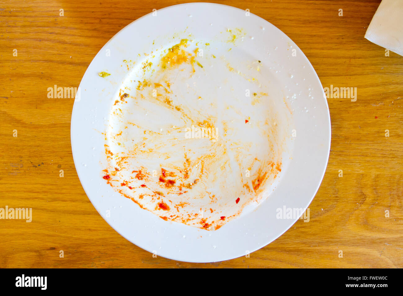This plate used to have food on it but everything was been eaten at