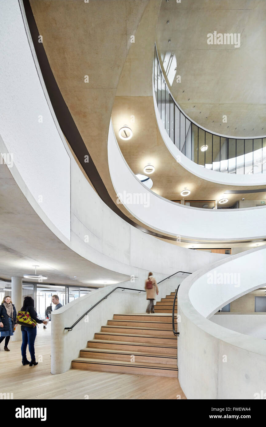Entrance foyer with circular atrium and stairway. The Blavatnik School of Government at the