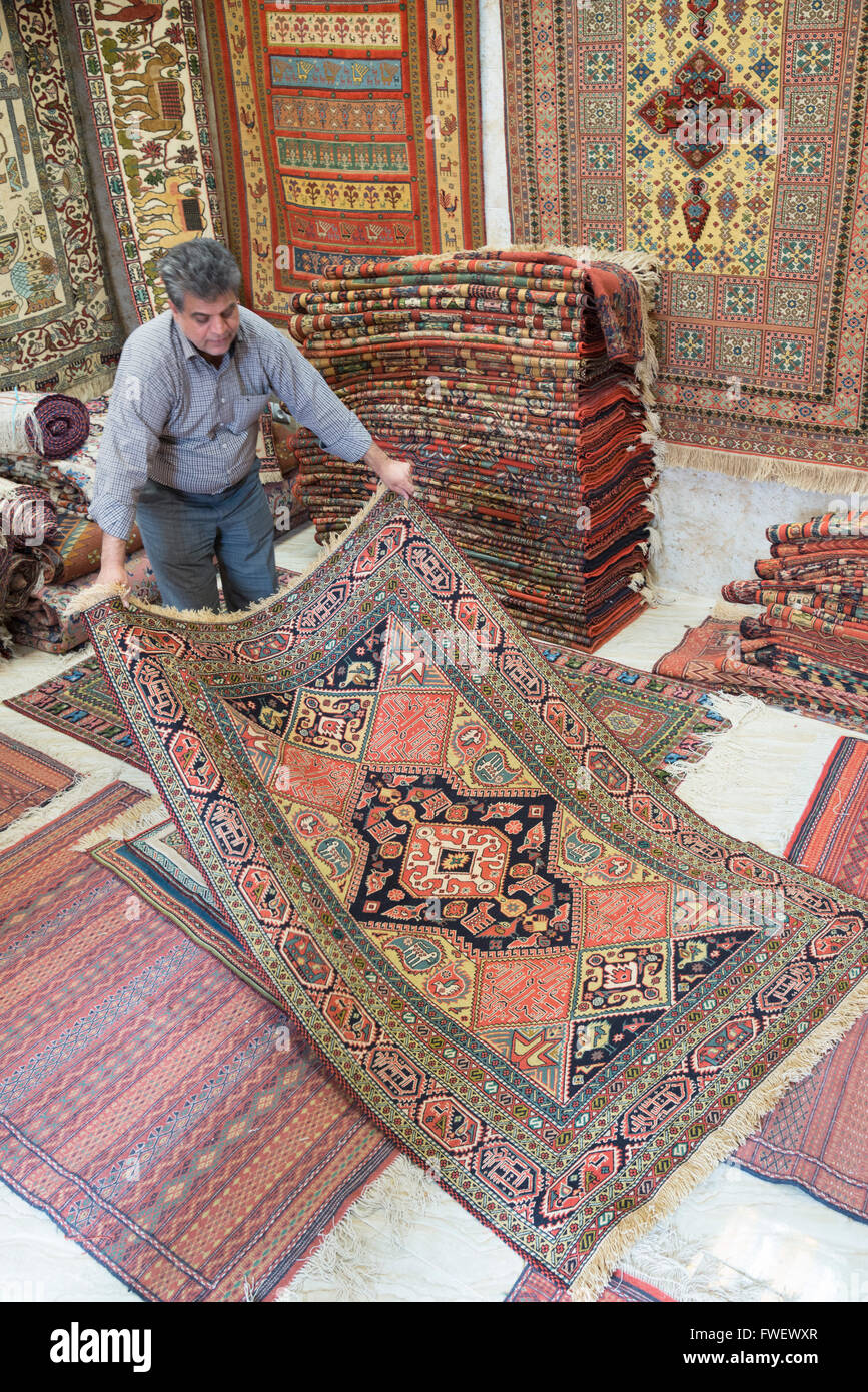 carpet trader, Mashhad, Iran, Western Asia Stock Photo