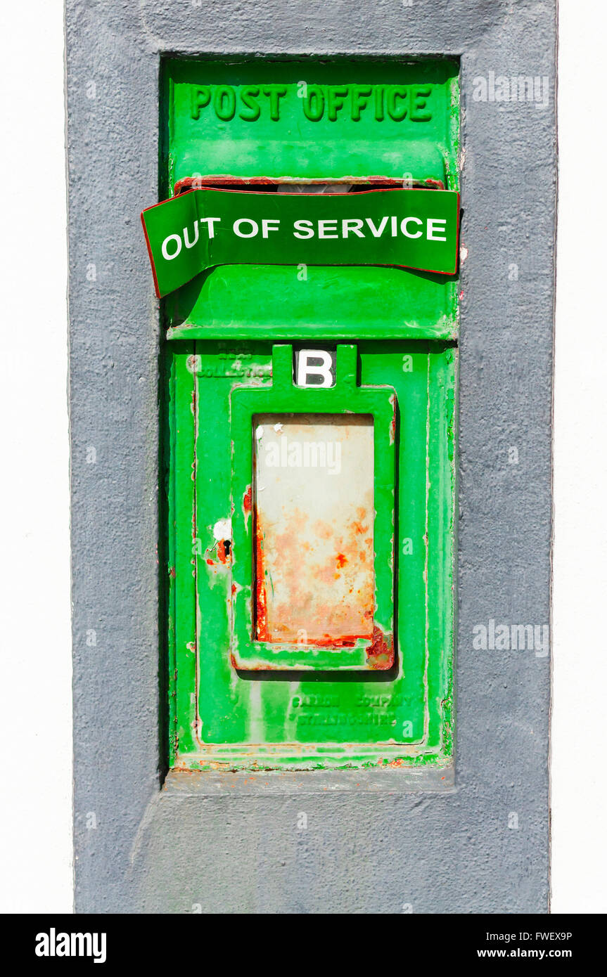 Green Irish An Post postbox, with 'Out of Service' sign across the letterbox. Stock Photo