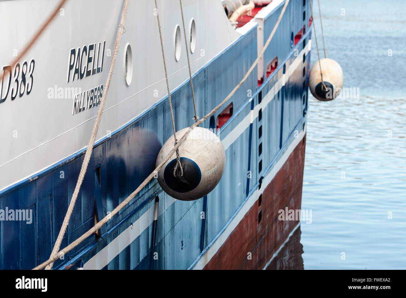 Fenders on the side of a fishing trawler in Killybegs, Ireland. Stock Photo