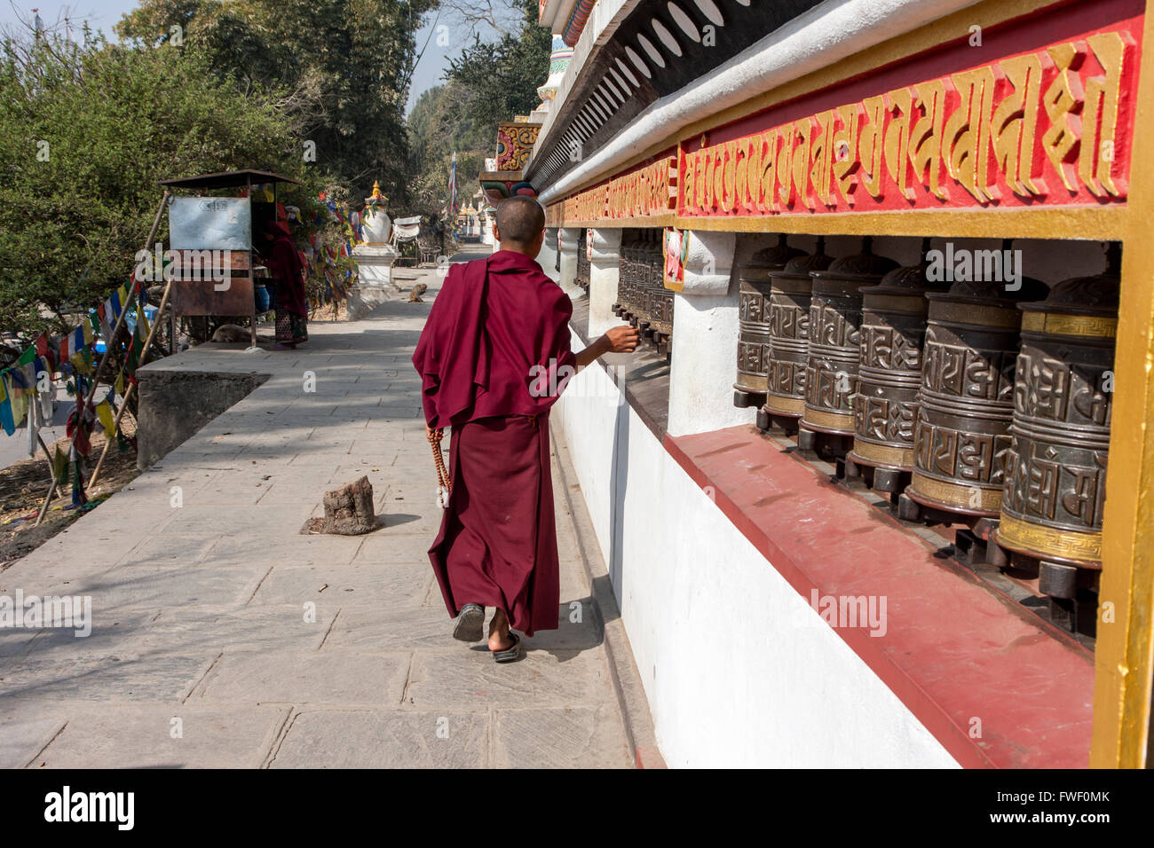 Buddhist monk at prayer hi-res stock photography and images - Alamy