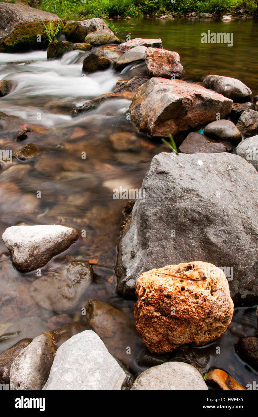 Natural bridge made of the rocks in the mountain river Stock Photo Alamy