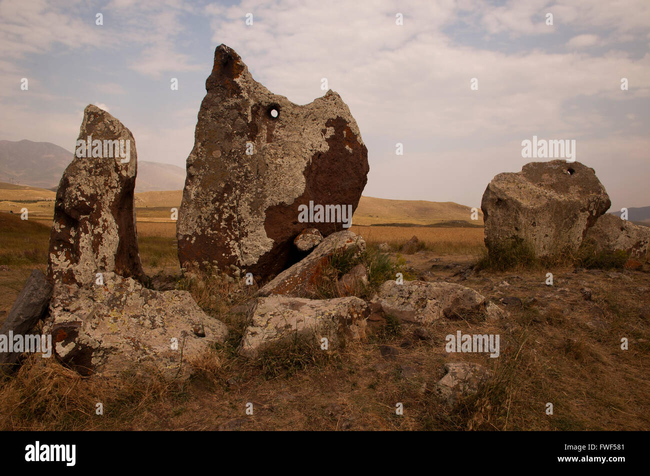 Zorats Karer (also called Karahunj or Carahunge) is an archaeological site with ancient observatory, known as armenian Stoneheng Stock Photo