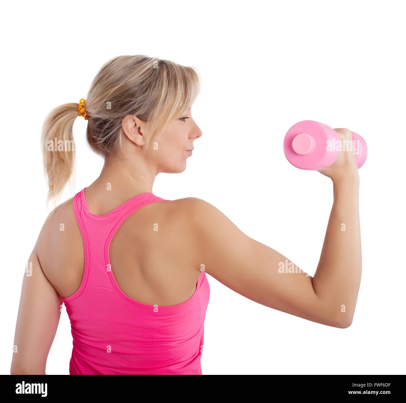 beautiful young woman with dumbbell Stock Photo