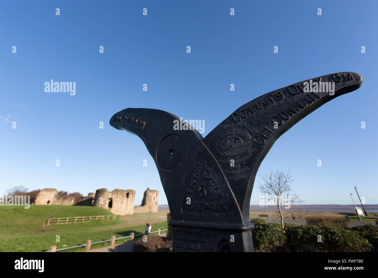 The Wales Coastal Path in North Wales. Picturesque view of a Welsh Millennium Milepost at Flint. Stock Photo