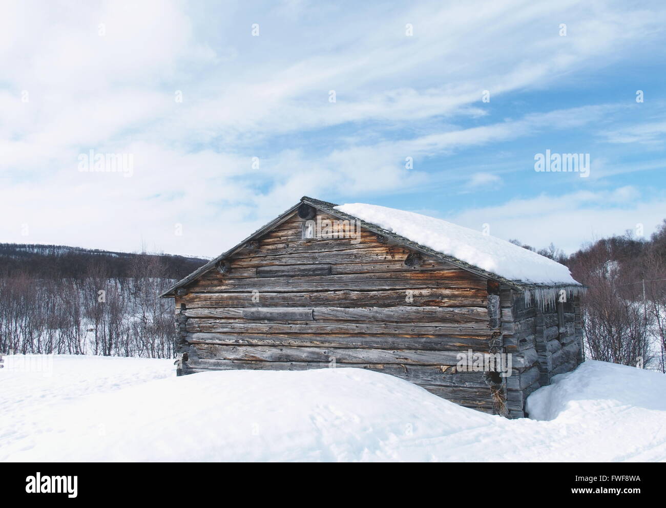 Old barn in swedish mountains Stock Photo
