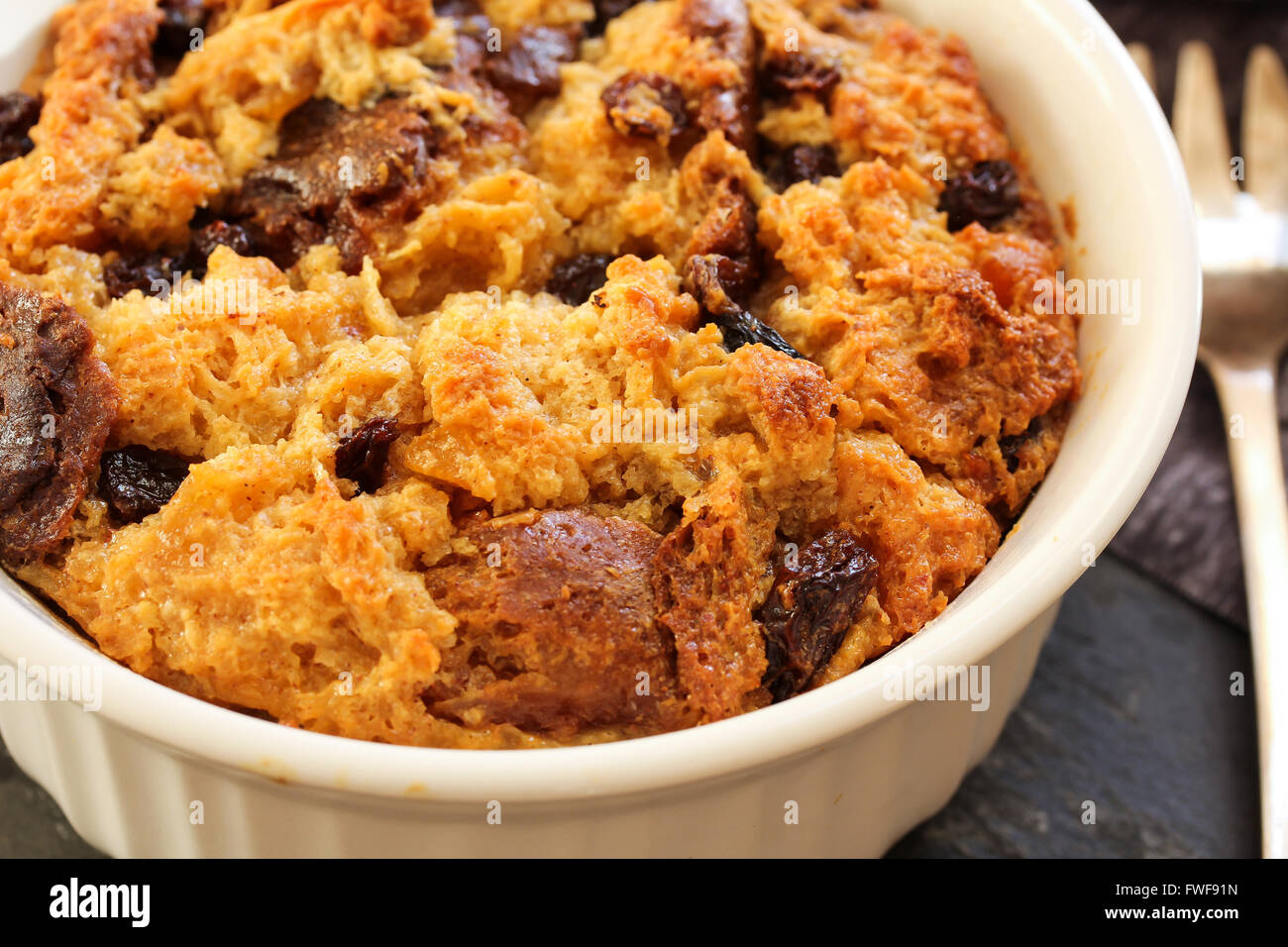 Bread pudding in a white ramekin Stock Photo Alamy