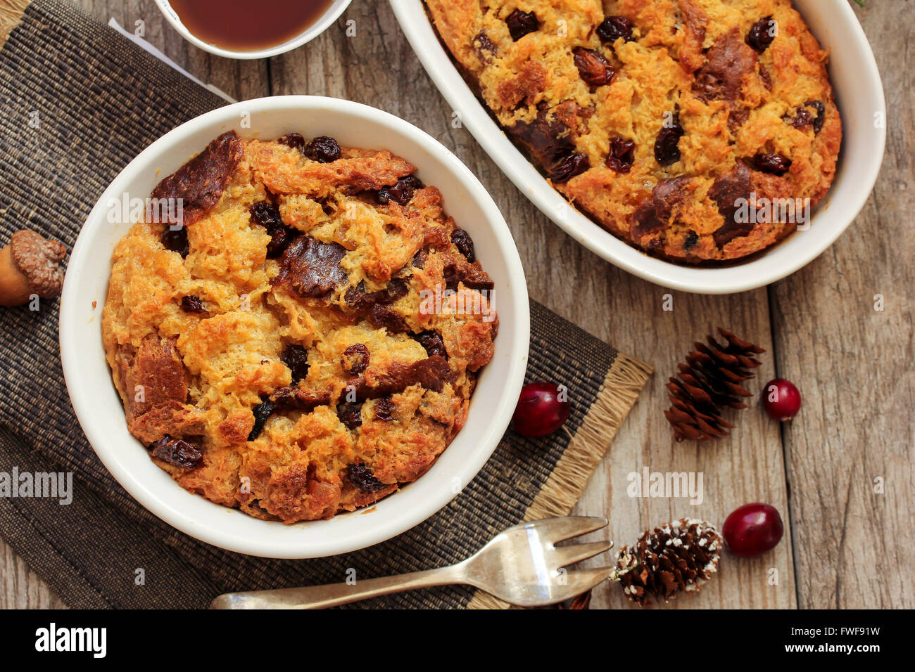 Bread pudding in a white ramekin Stock Photo Alamy