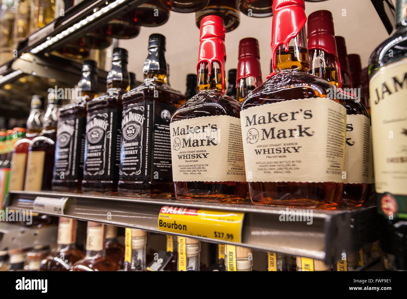 bottles of Maker's Mark bourbon whiskey on a shelf at a store Stock Photo