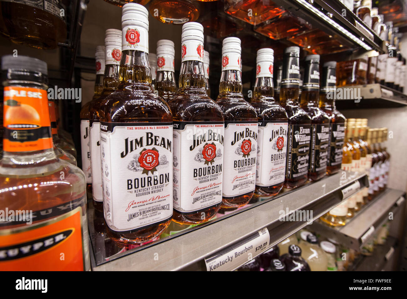 bottles of Jim Beam bourbon whiskey on a shelf at a store Stock Photo Alamy