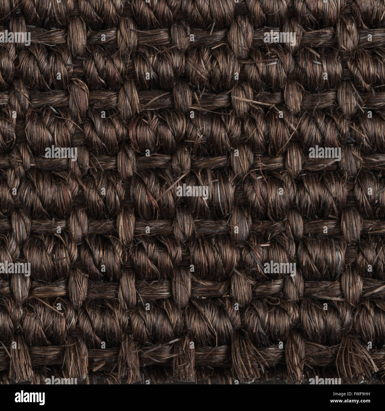 Closeup detail of a brown sisal carpet texture background Stock Photo