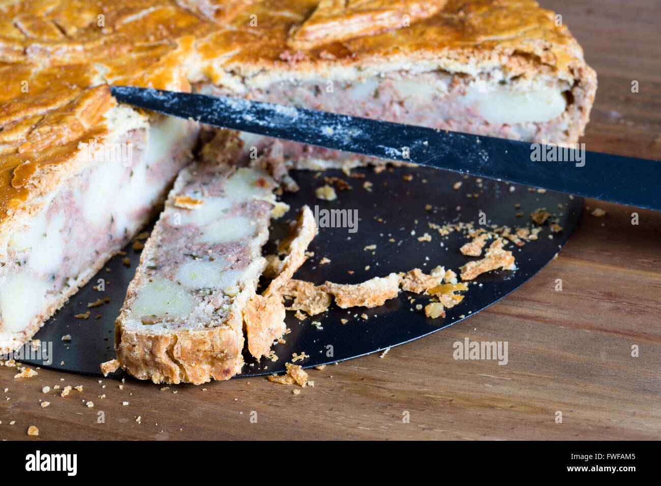 Homemade Corned Beef and Potato Pie sliced and ready to serve Stock