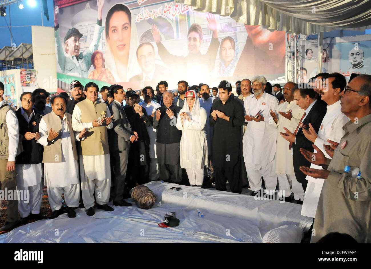 Peoples Party (PPP) Chairman, Bilawal Bhutto Zardari and Bakhtawar Bhutto Zardari along others offer Dua on occasion of 37th death anniversary commemorate of Peoples Party (PPP) Founder, Zulfiqar Ali Bhutto held at Bhutto's Mausoleum in Garhi Khuda Bux on Monday, April 04, 2016. Stock Photo