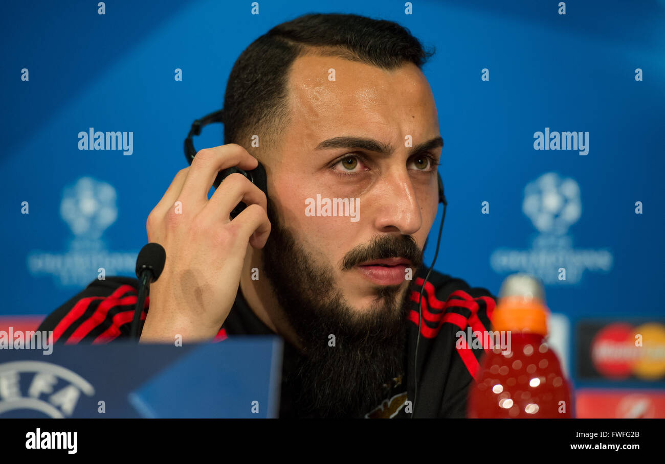 Munich, Germany. 4th Apr, 2016. Lisbon's Kostas Mitroglou speaks during a press conference at the Allianz Arena soccer stadium in Munich, Germany, 4 April 2016. The Benfica Lissabon is going to play against FC Bayern Munich in the Champions League quarter final soccer match on 5 April 2016. Photo: Sven Hoppe/dpa/Alamy Live News Stock Photo