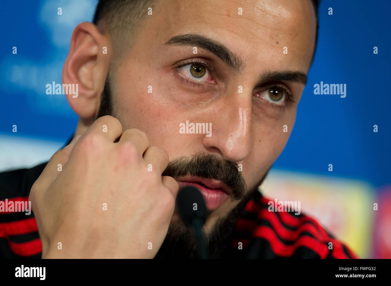 Munich, Germany. 4th Apr, 2016. Lisbon's Kostas Mitroglou speaks during a press conference at the Allianz Arena soccer stadium in Munich, Germany, 4 April 2016. The Benfica Lissabon is going to play against FC Bayern Munich in the Champions League quarter final soccer match on 5 April 2016. Photo: Sven Hoppe/dpa/Alamy Live News Stock Photo