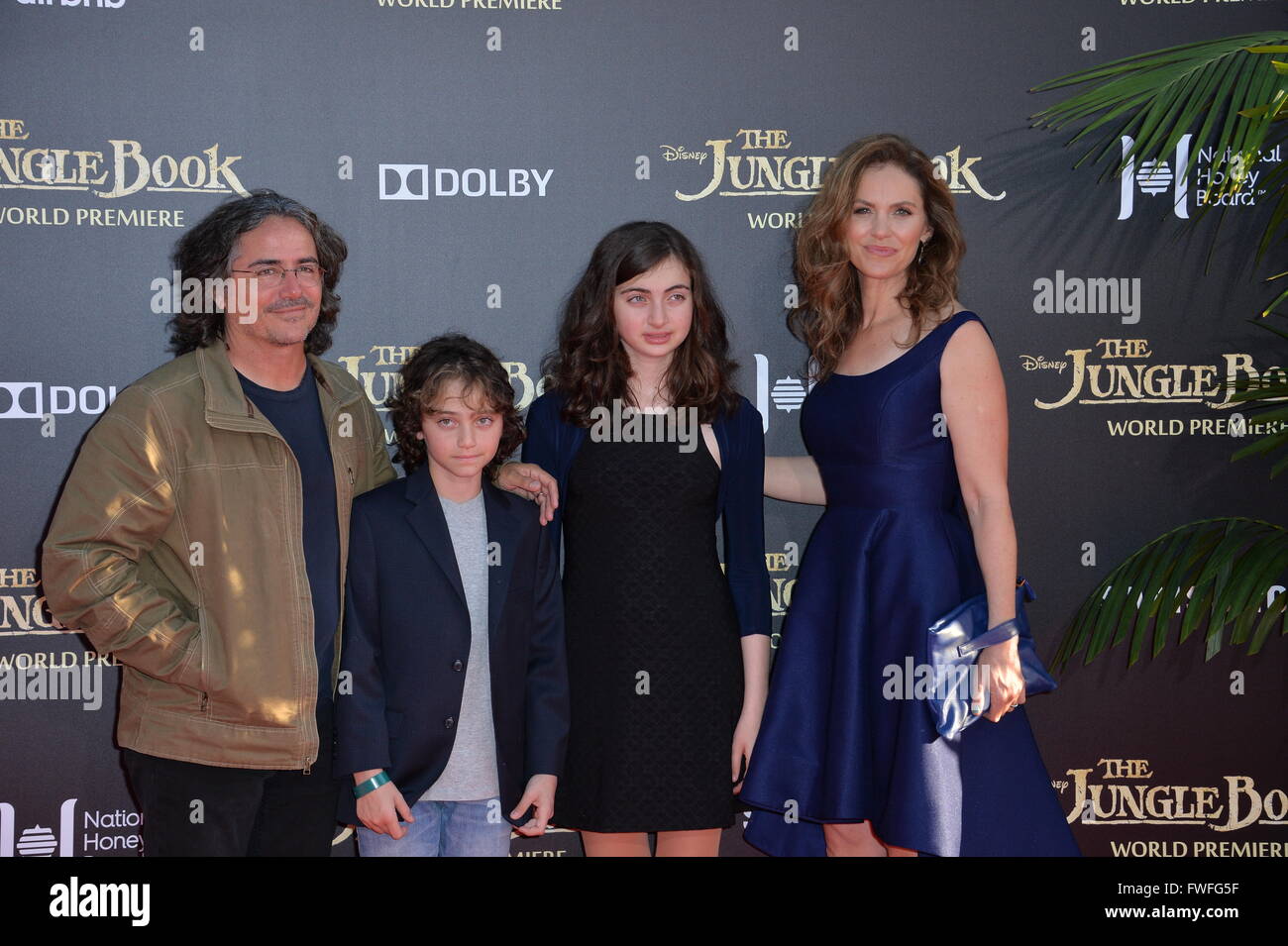 Los Angeles, California, USA. April 4, 2016. Actress Amy Brenneman & husband Brad Silberling & children at the world premiere of 'The Jungle Book' at the El Capitan Theatre, Hollywood.  Credit:  Sarah Stewart/Alamy Live News Stock Photo