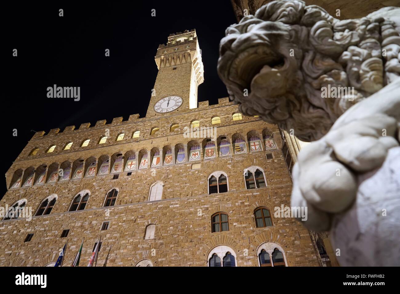 Italy: Palazzo Vecchio (town hall) with Medici-Lion, seen from Loggia dei Lanzi in Florence. Photo from 21. February 2016. Stock Photo
