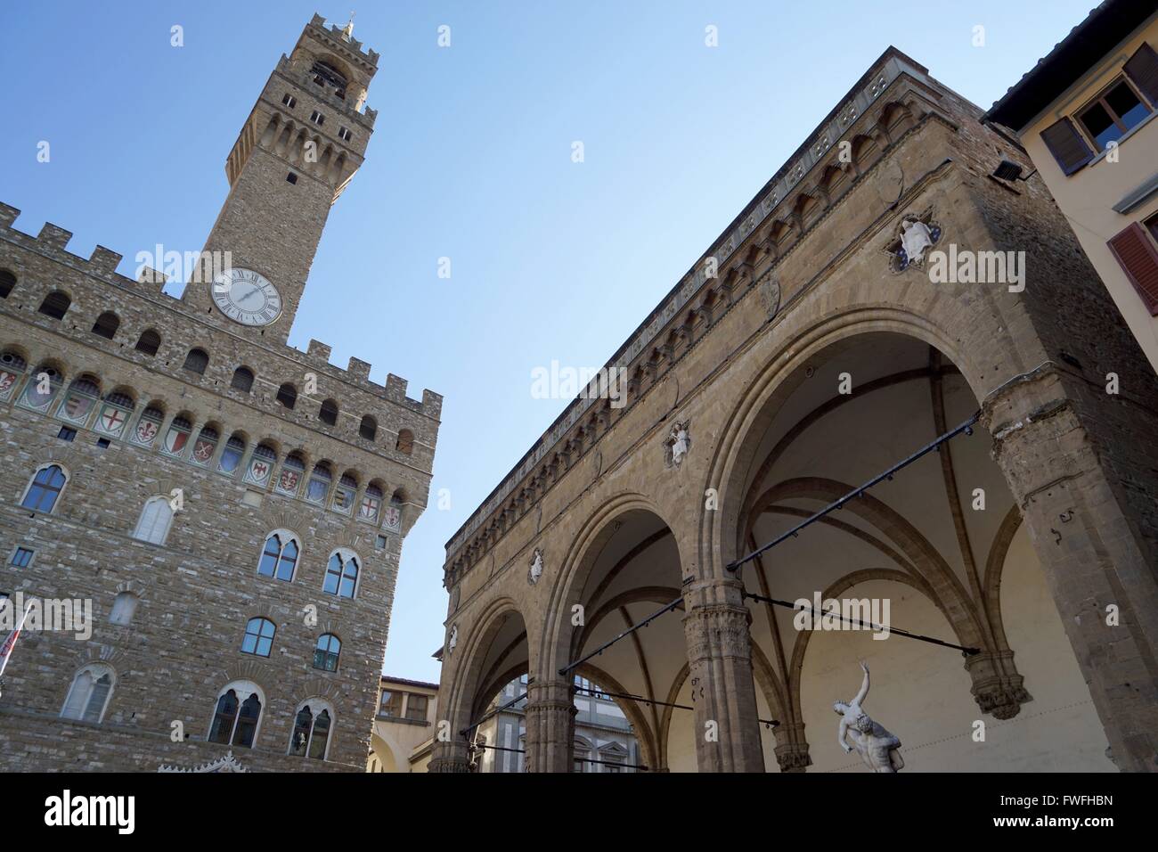 Italy: Palazzo Vecchio (town hall, left) and Loggia dei Lanzi (right) at Piazza della Signoria in Florence. Photo from 20. February 2016. Stock Photo