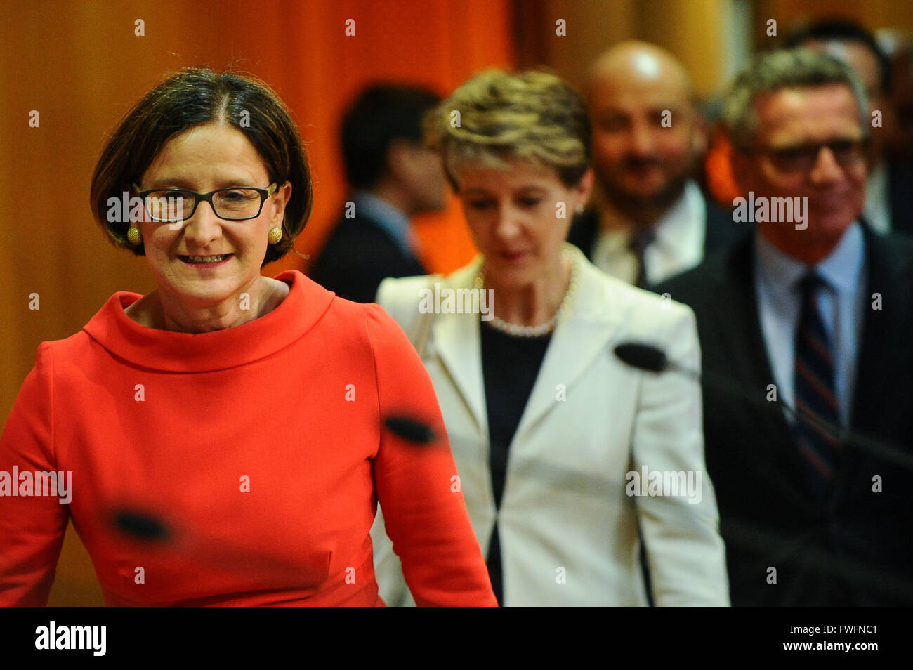 Vienna, Austria. 5th Apr, 2016. (L-R) Austrian Interior Minister Johanna Mikl-Leitner, Swiss Justice Minister Simonetta Sommaruga and German Interior Minister Thomas de Maiziere arrive for a press conference in Vienna, Austria, April 5, 2016. Government officials of Austria, Germany, Liechtenstein, Luxembourg and Switzerland held a meeting in Vienna on Tuesday to discuss issues related to refugees. © Qian Yi/Xinhua/Alamy Live News Stock Photo