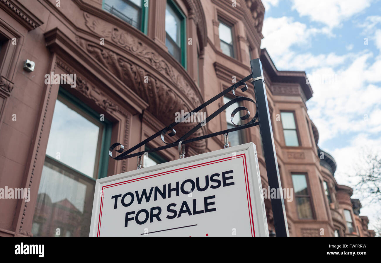 Sign for townhouse for sale in Harlem near Mount Morris Park on Saturday, April 2, 2016. (© Richard B. Levine) Stock Photo