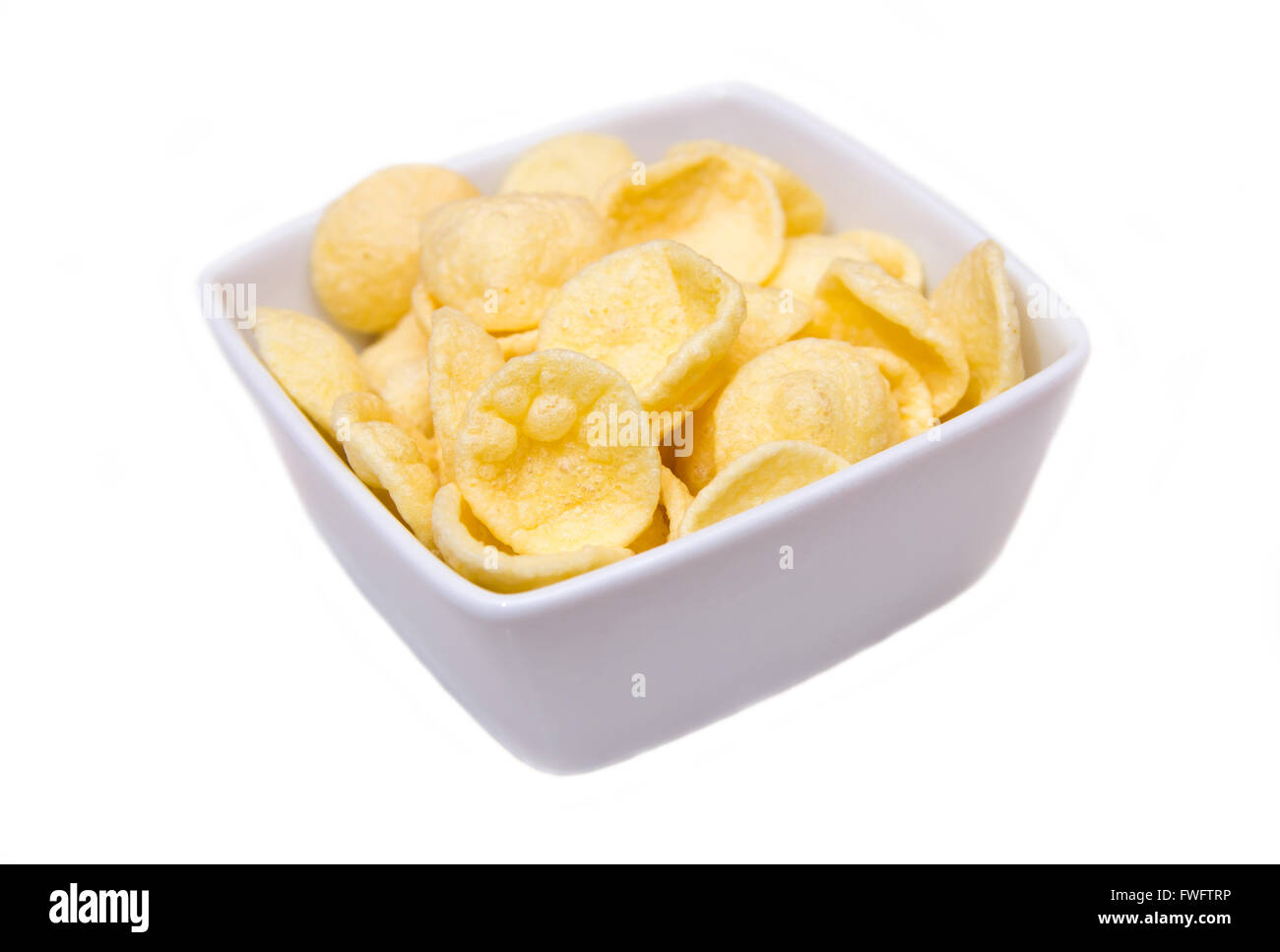 Potato snacks on a square bowl on white background Stock Photo