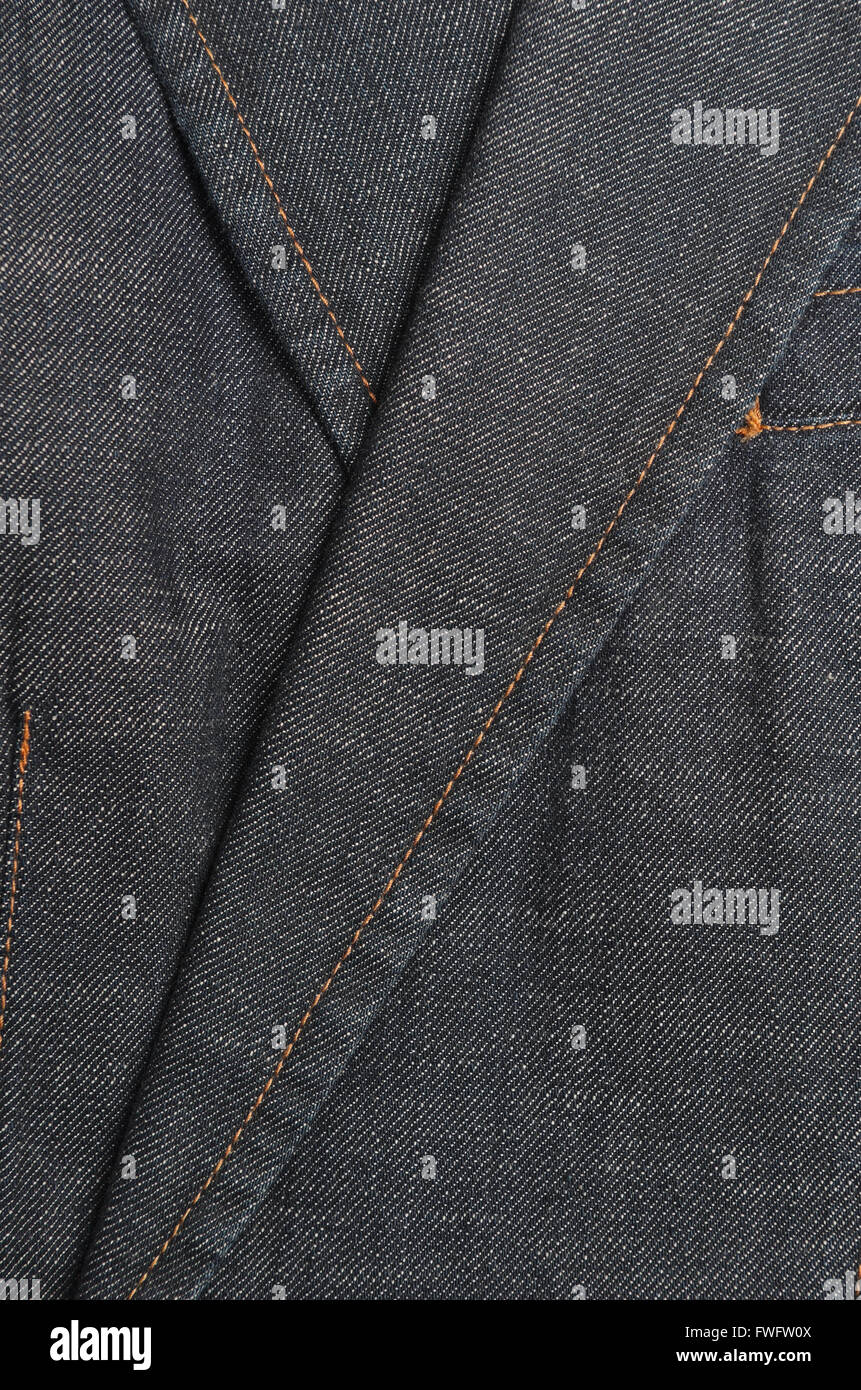 Lapel detail of a classic denim blazer jacket. Fashion, textures and backgrounds Stock Photo