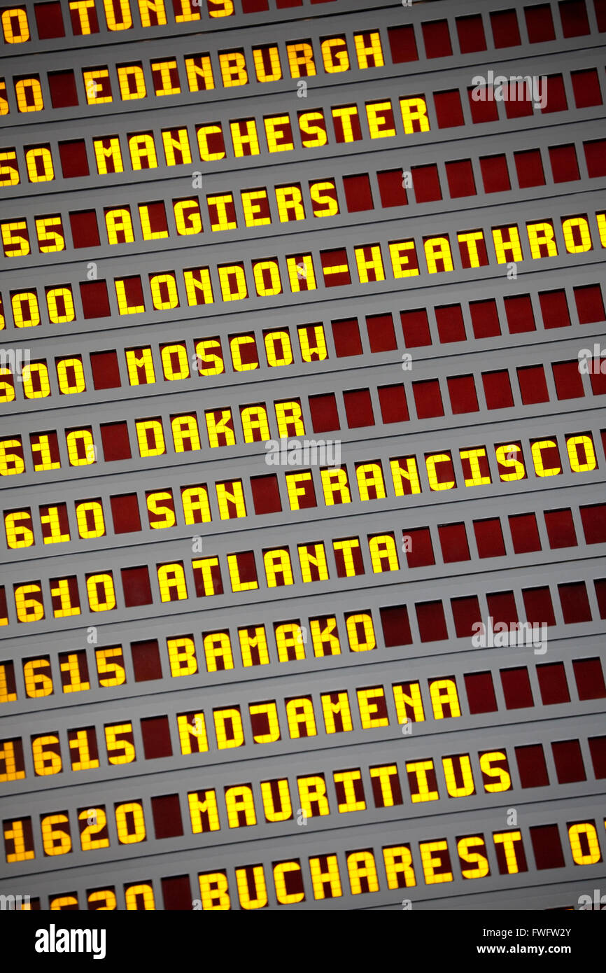 Airport arrivals and departures board. Stock Photo