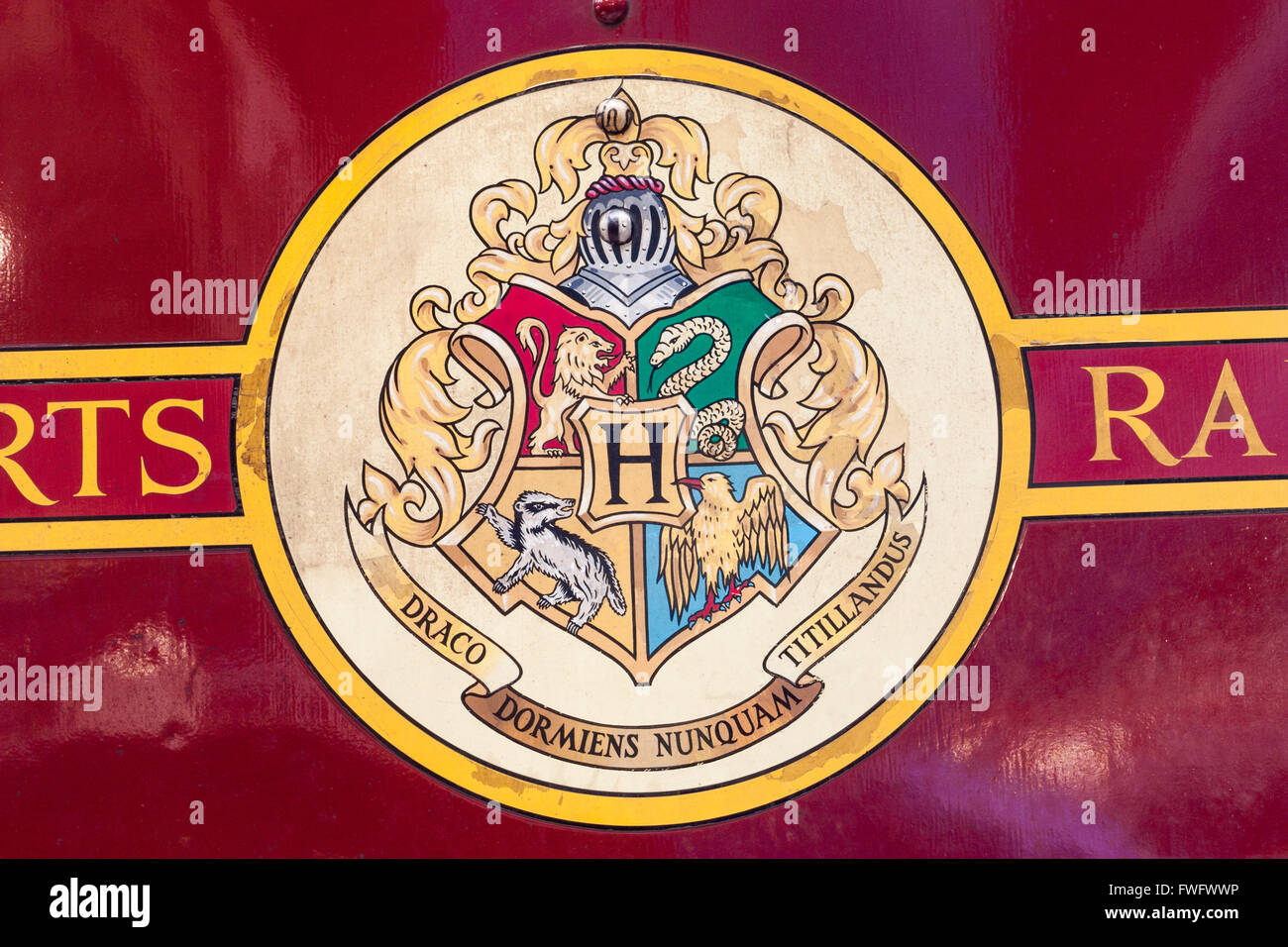 Hogwarts Latin motto on Hogwarts Express, the train used in Harry Potter films. Stock Photo