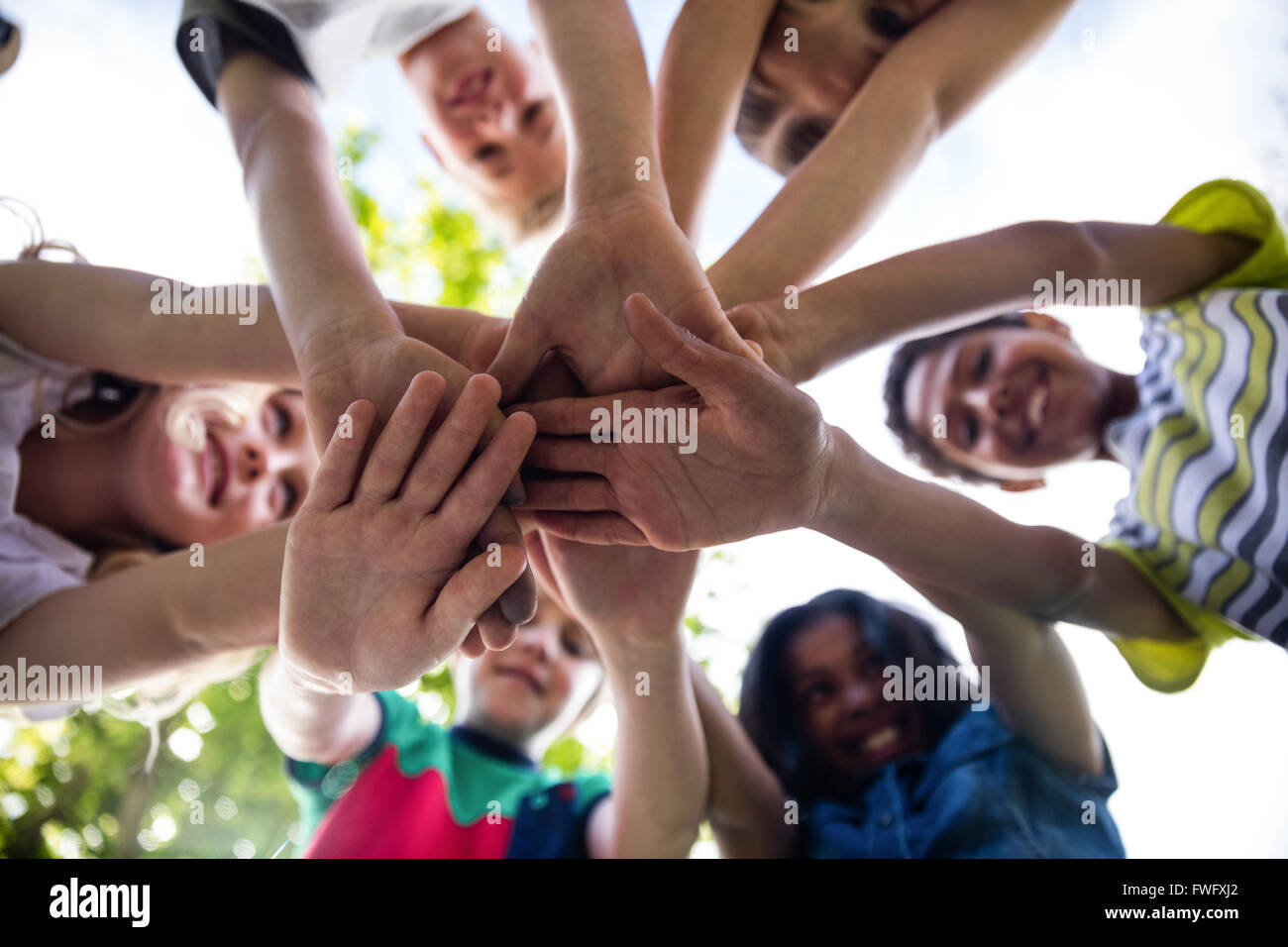 Children hands circle hi-res stock photography and images - Alamy