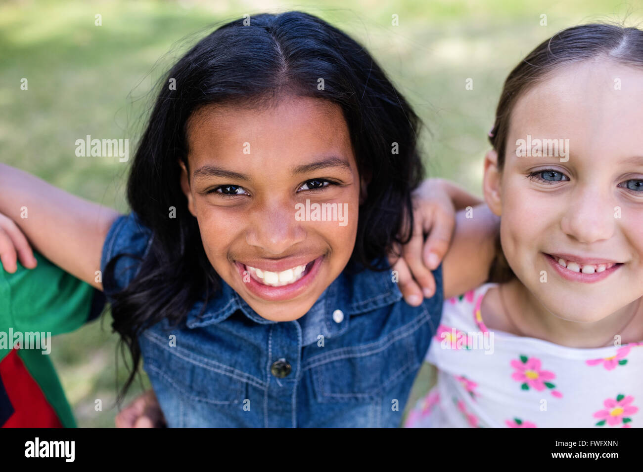 Girls standing in park hi-res stock photography and images - Alamy