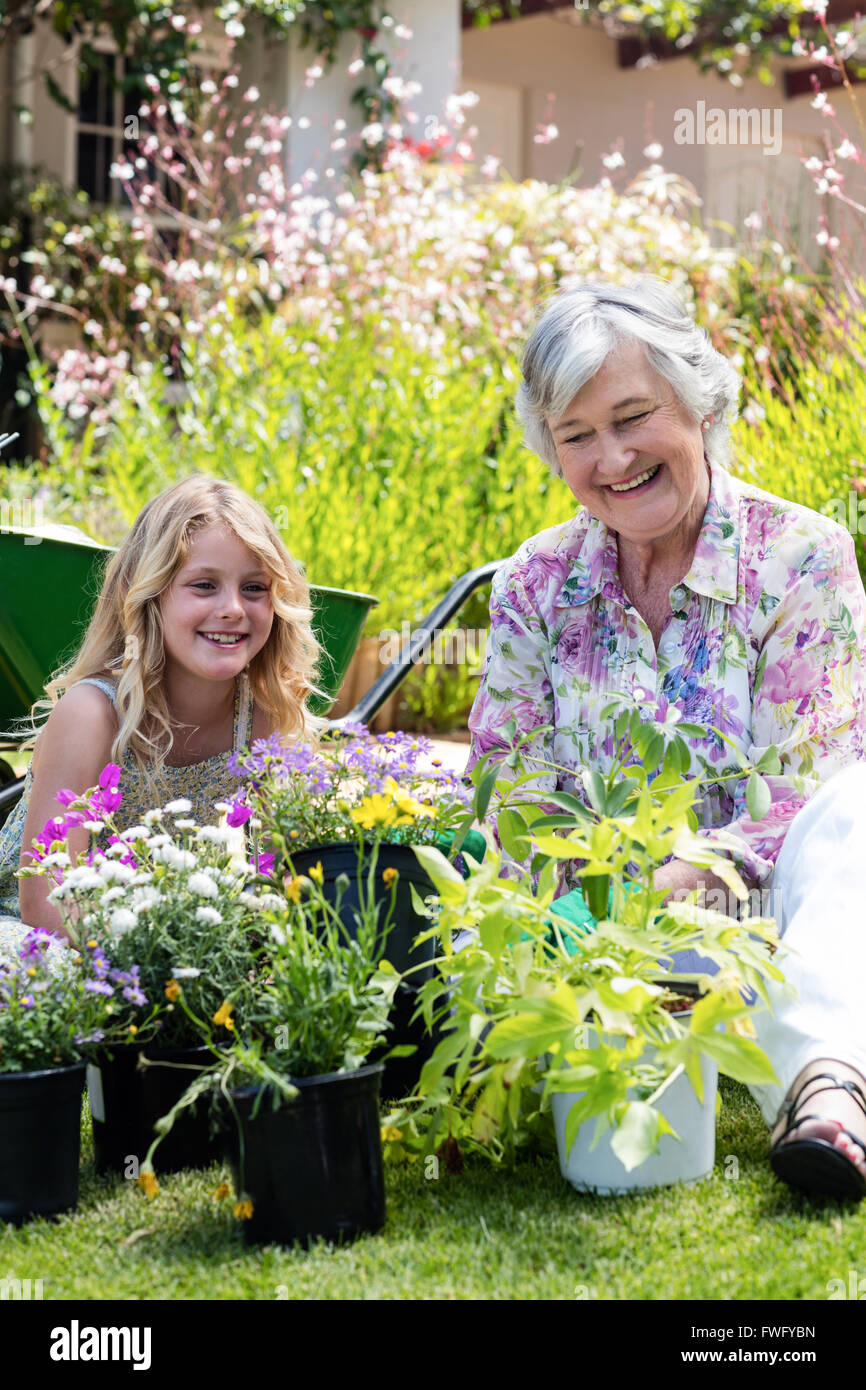 Grandmother and granddaughter gardening together Stock Photo