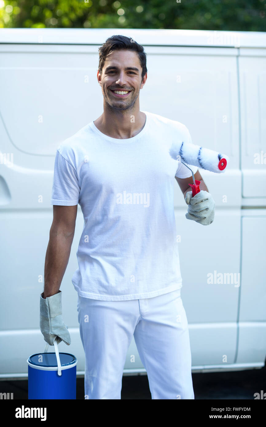 Portrait of happy painter with equipment Stock Photo Alamy