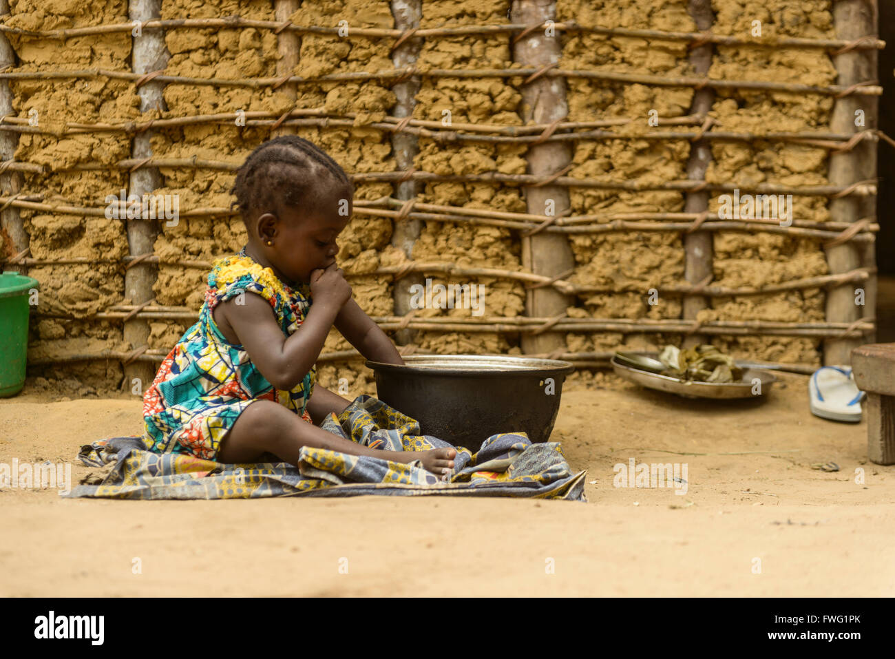 Girl eating, Democratic Republic of Congo Stock Photo