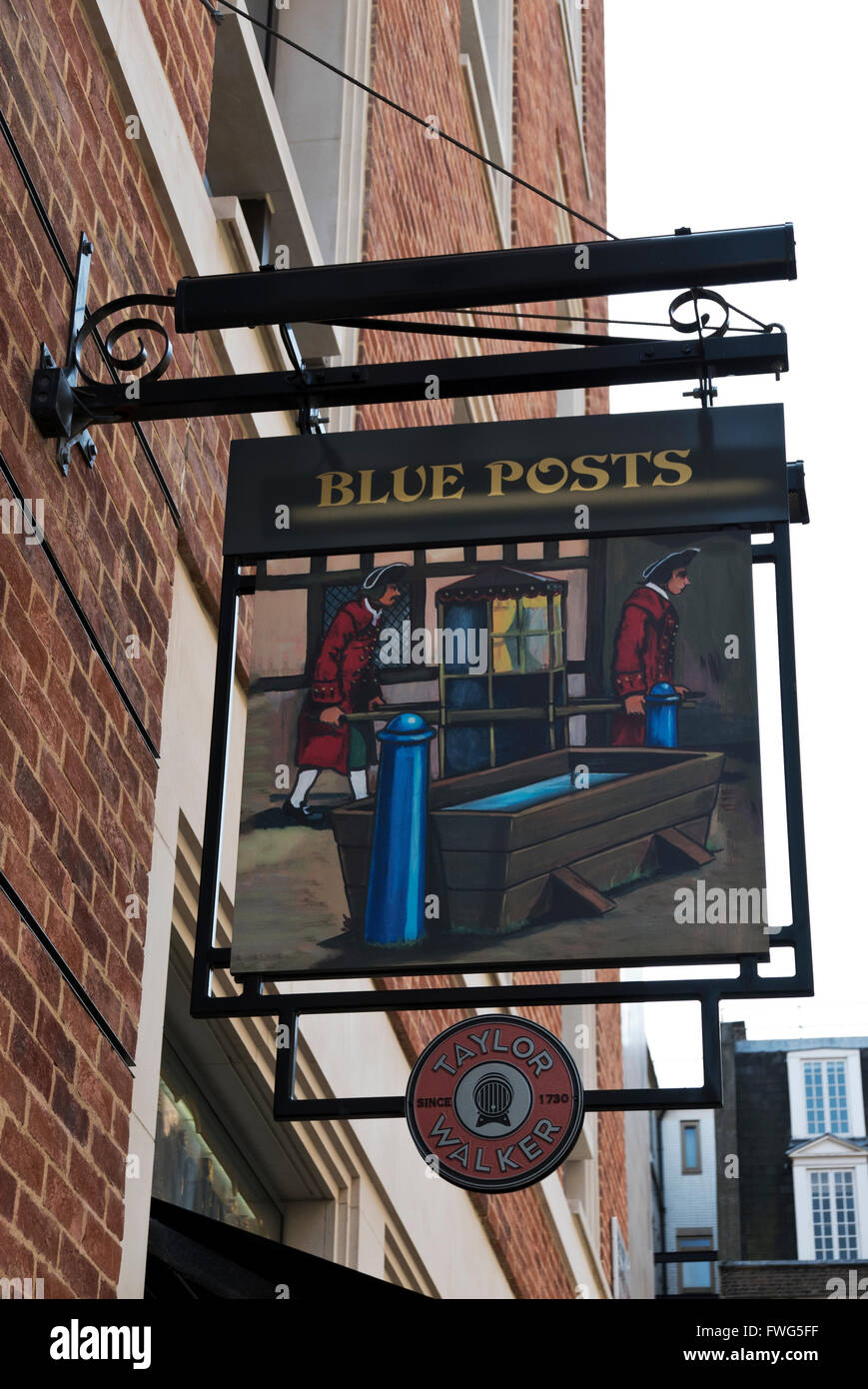 A banner on the exterior of the Blue Posts pub in London, United