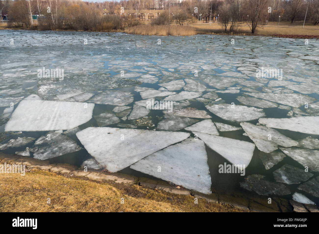 Melting ice on spring lake Stock Photo