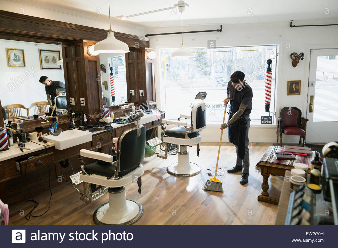 Broom Sweeping Floor Stock Photos & Broom Sweeping Floor Stock Images Alamy