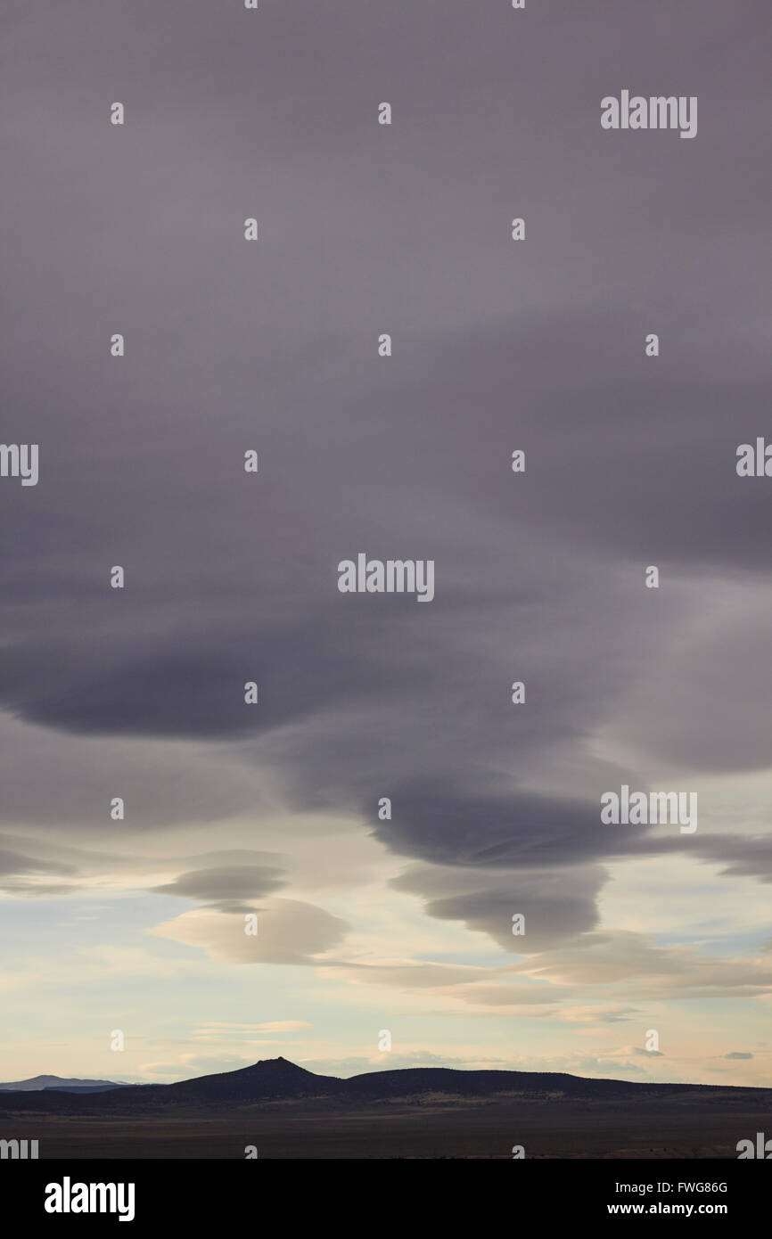 Oncoming storm at twilight, Taos, New Mexico, USA with stratus, nimbus and cumulonimbus clouds. Stock Photo