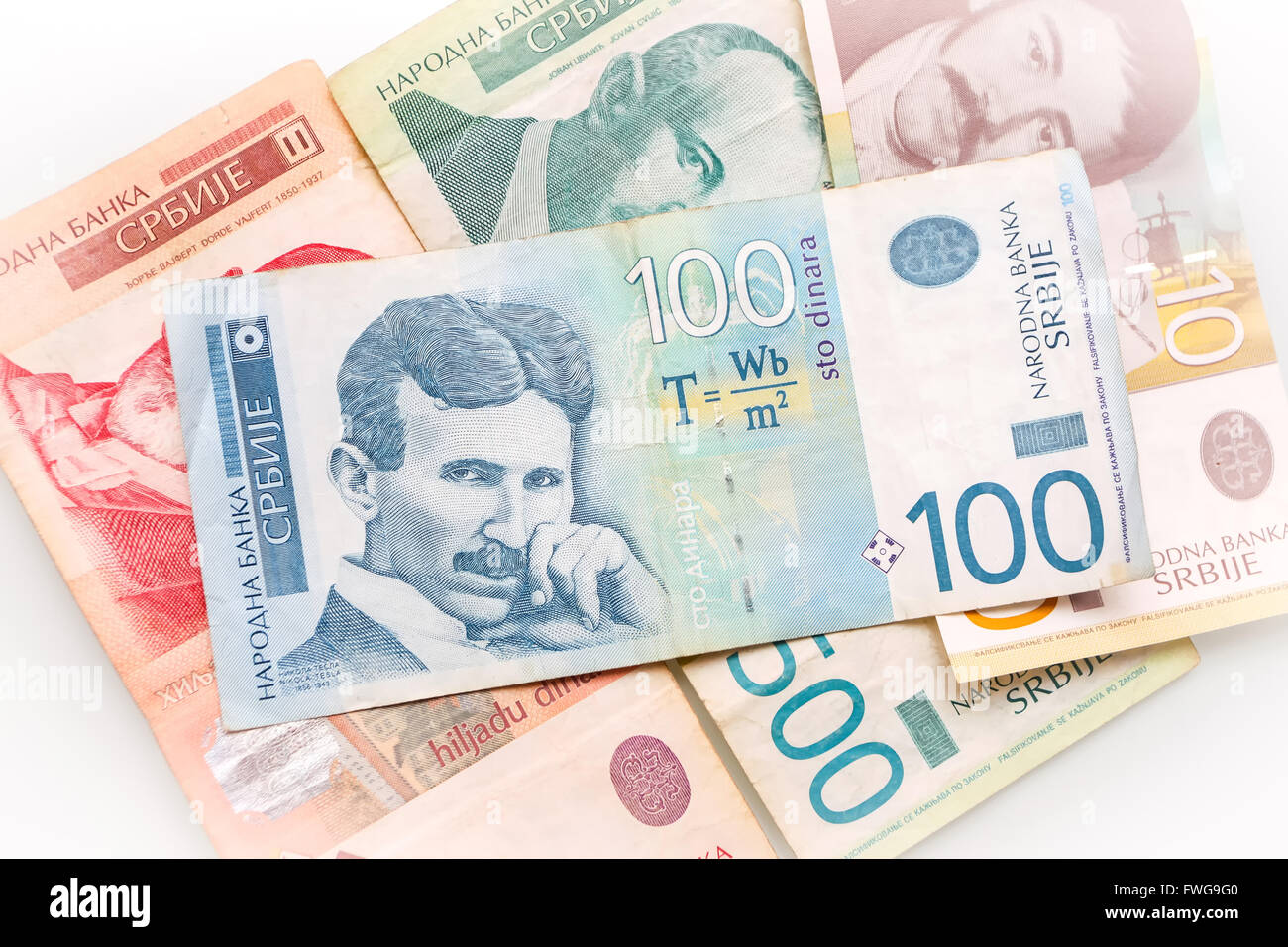 100-serbian-dinar-bill-on-top-of-different-serbian-dinar-bills