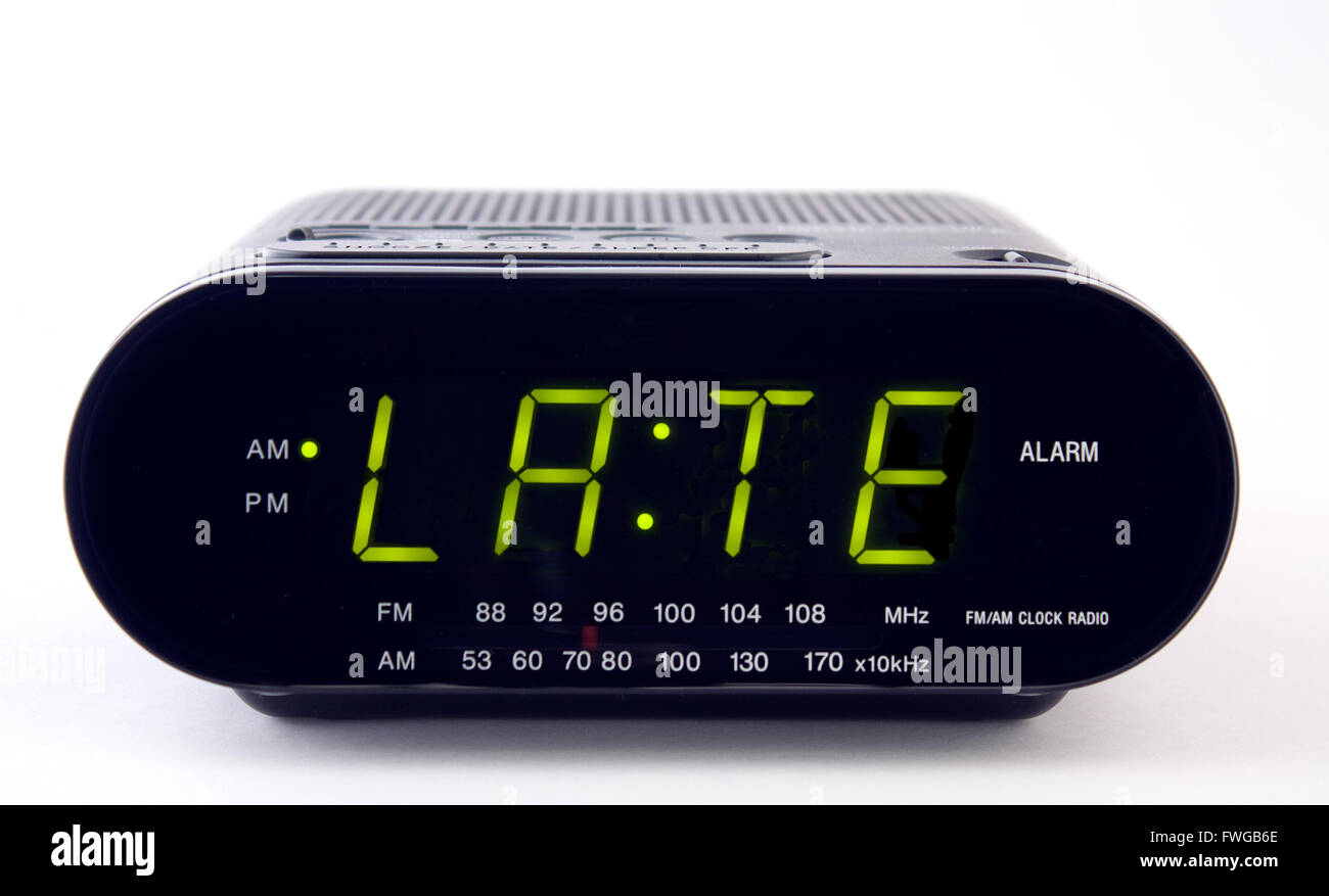 A clock radio with the word LATE Stock Photo Alamy