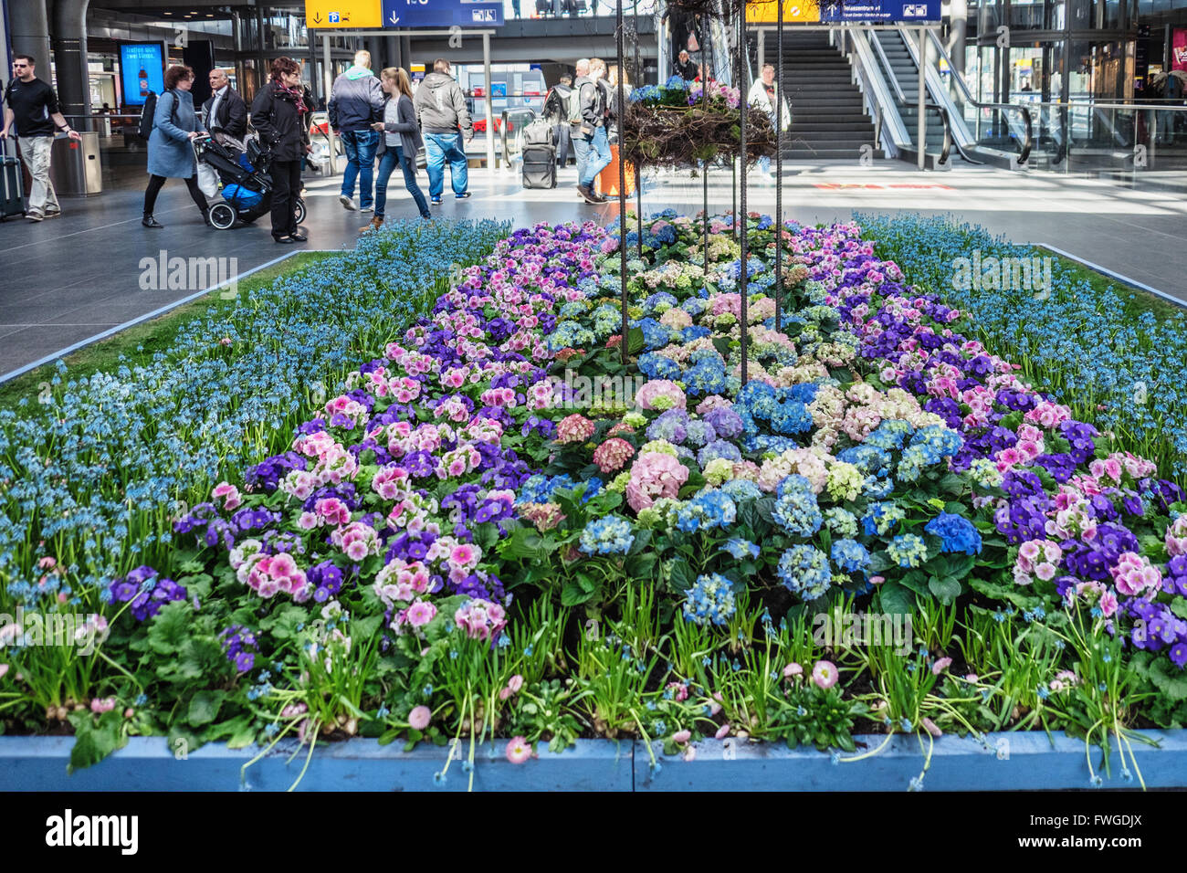 Display of Spring flowers and the Hauptbahnhof, Main Railway station in Berlin Stock Photo