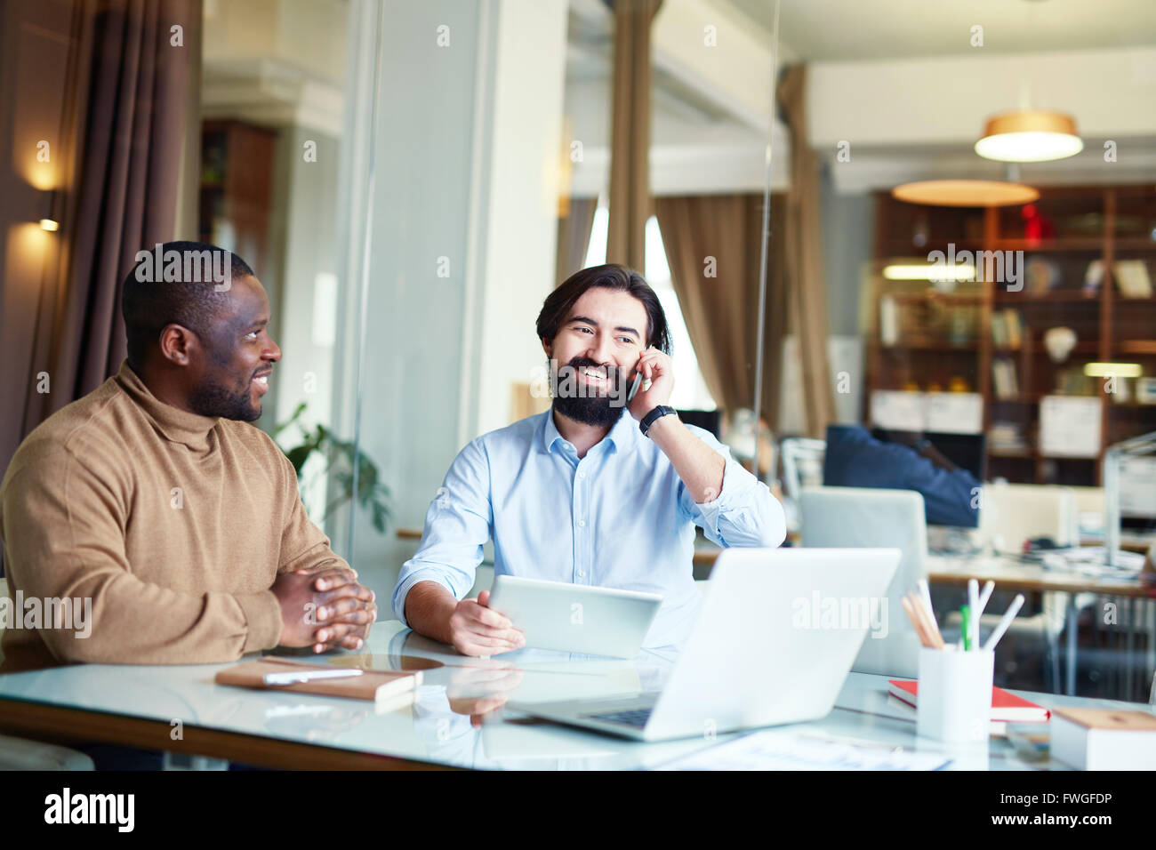 Calling at meeting Stock Photo - Alamy
