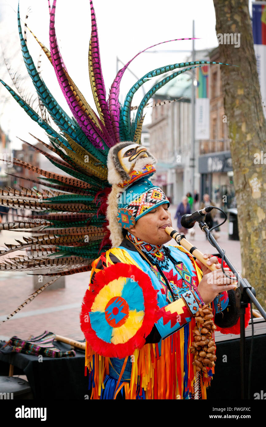 A Peruvian busker from South America playing music on the street, Broad Street, Reading Berkshire UK Stock Photo