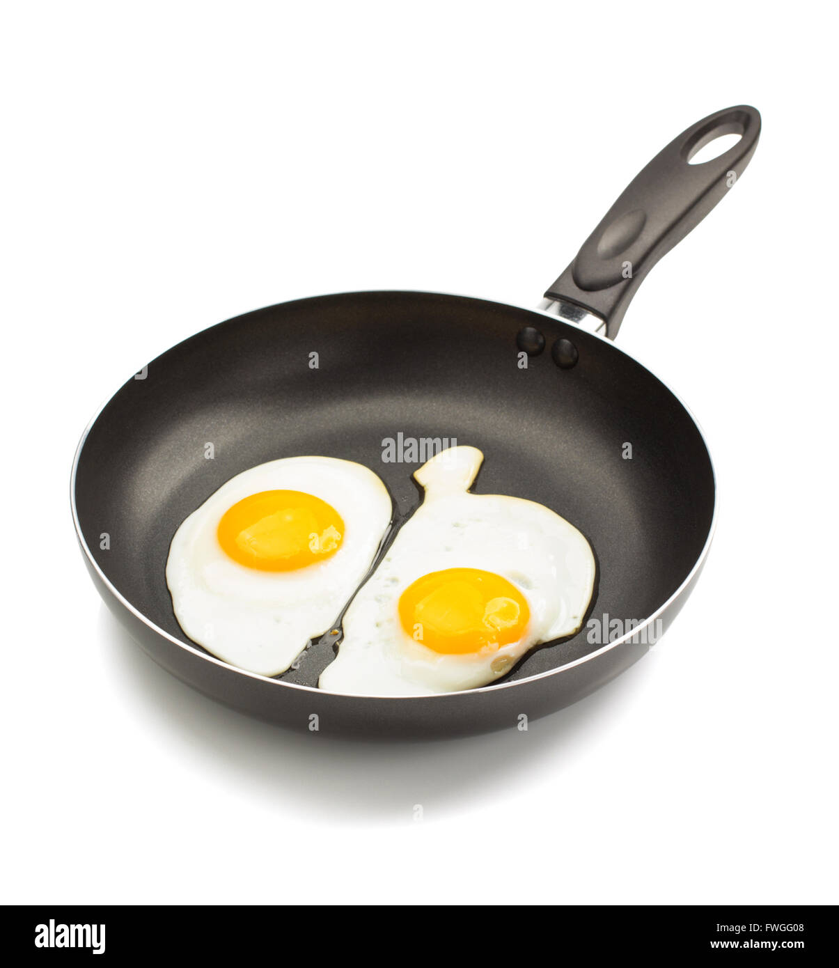 fried egg in frying pan isolated on white background Stock Photo - Alamy