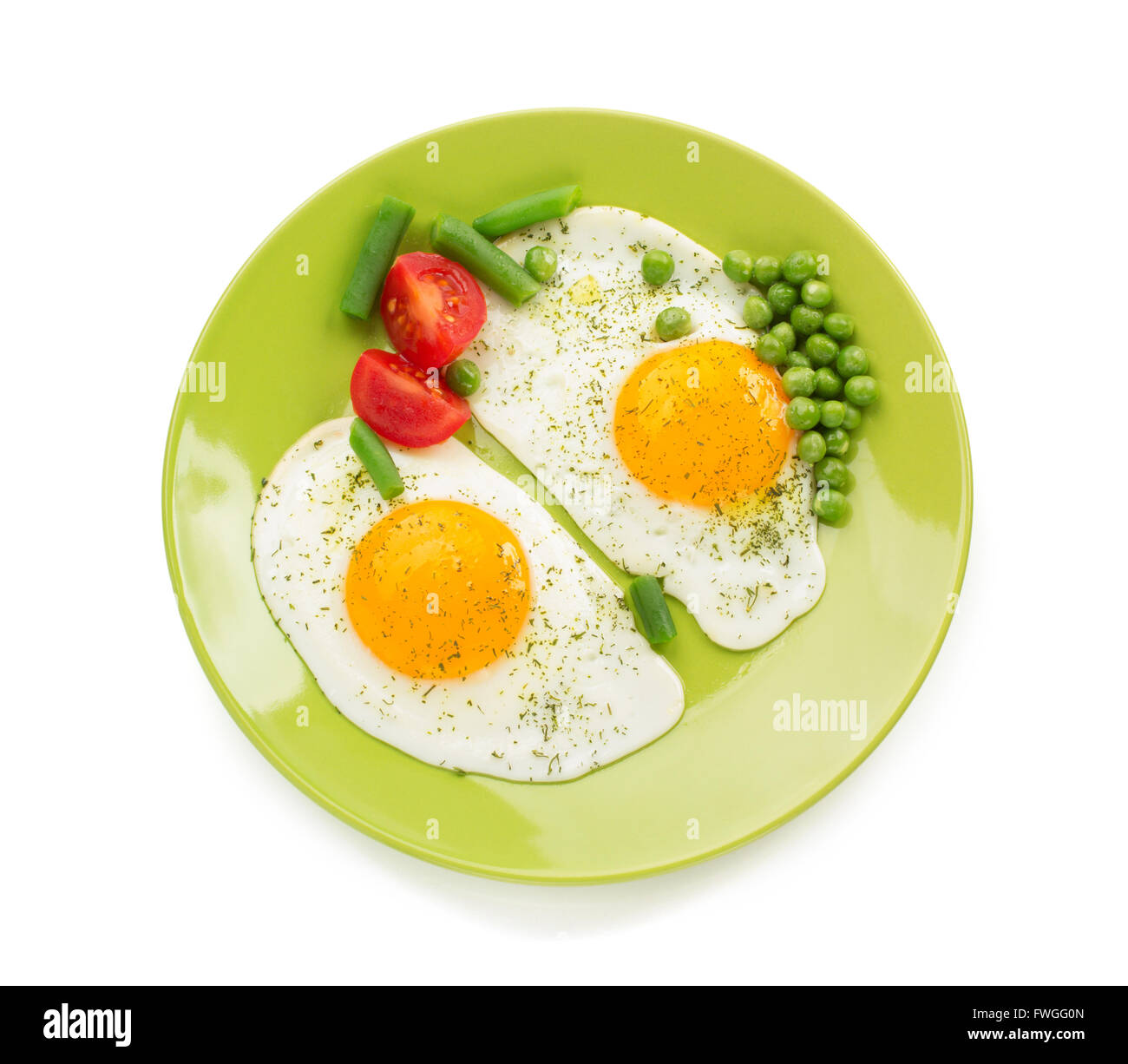 fried egg in plate isolated on white background Stock Photo - Alamy