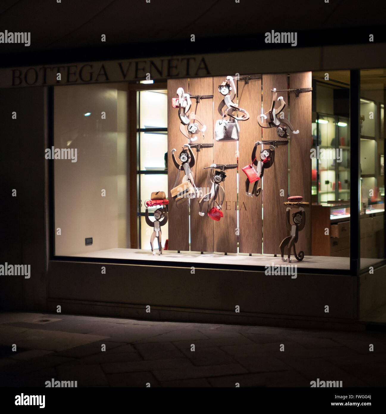 Bottega Vaneta shop illuminated at night in Venice, Italy. Stock Photo